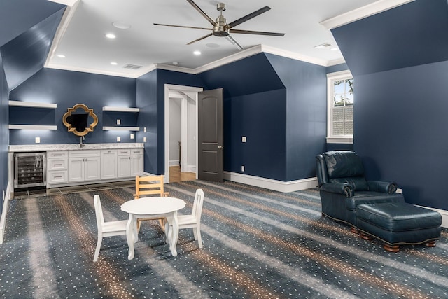 1024 Vaughn Crest Dr, Franklin, TN 37069 - home theater with beverage cooler, a ceiling fan, carpet, ornamental molding, and recessed lighting