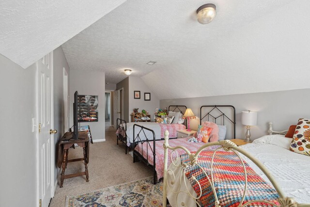 2104 Loudenslager Dr, Thompsons Station, TN 37179 - bedroom with light colored carpet, a textured ceiling, and vaulted ceiling