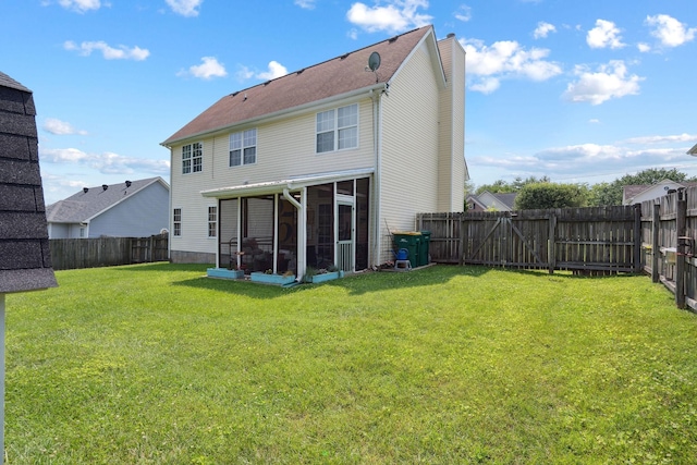 2104 Loudenslager Dr, Thompsons Station, TN 37179 - rear view of house with a sunroom, a chimney, and a fenced backyard