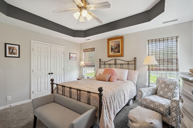2104 Loudenslager Dr, Thompsons Station, TN 37179 - carpeted bedroom featuring a closet, a ceiling fan, and a raised ceiling