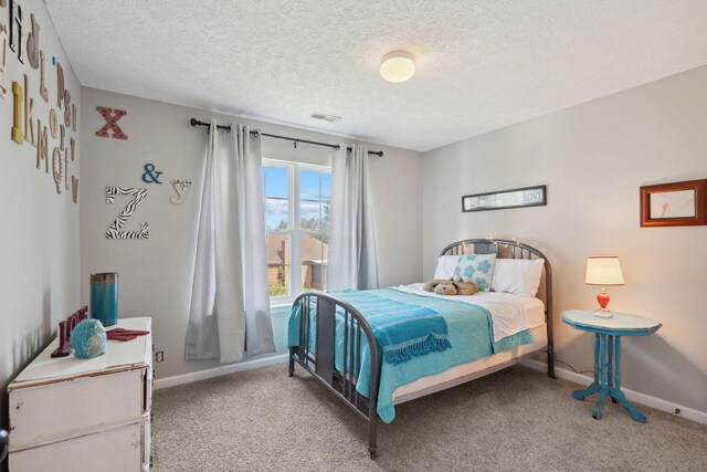 2104 Loudenslager Dr, Thompsons Station, TN 37179 - bedroom featuring carpet floors and a textured ceiling