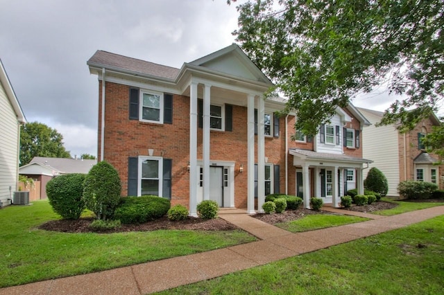 8954 Sawyer Brown Rd, Nashville, TN 37221 - greek revival inspired property featuring brick siding, central AC, and a front lawn