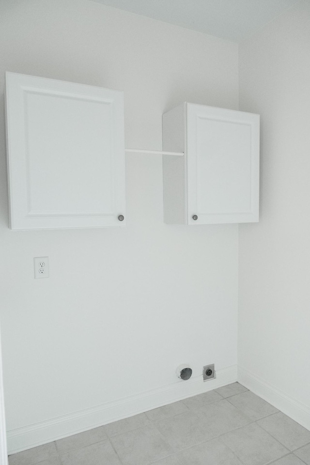 1159 Fairvue Village Ln, Gallatin, TN 37066 - laundry room featuring electric dryer hookup, baseboards, and cabinet space