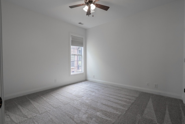1159 Fairvue Village Ln, Gallatin, TN 37066 - spare room featuring carpet, a ceiling fan, and baseboards