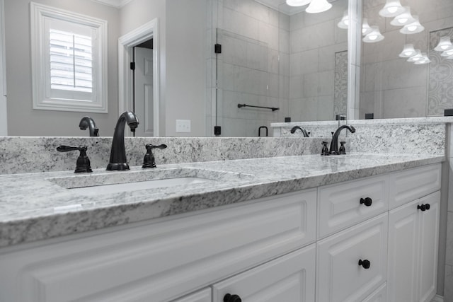 1159 Fairvue Village Ln, Gallatin, TN 37066 - bathroom featuring double vanity, ornamental molding, and a stall shower