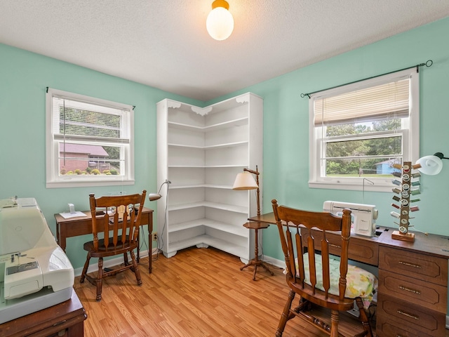 1574 Midway Rd, Sewanee, TN 37375 - office space with light wood finished floors, healthy amount of natural light, and a textured ceiling