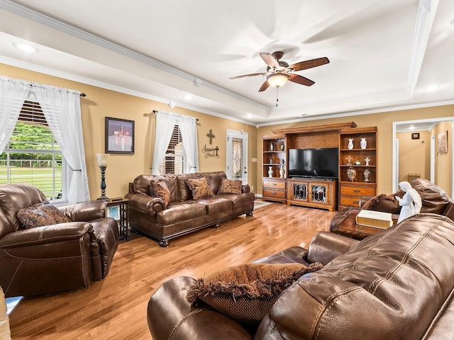 1574 Midway Rd, Sewanee, TN 37375 - living room featuring crown molding, a raised ceiling, a ceiling fan, and light wood-style floors
