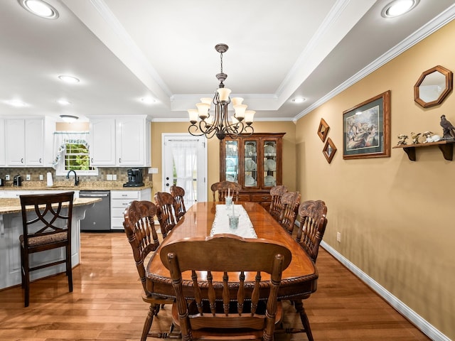 1574 Midway Rd, Sewanee, TN 37375 - dining area with crown molding, a chandelier, light wood-type flooring, a raised ceiling, and baseboards