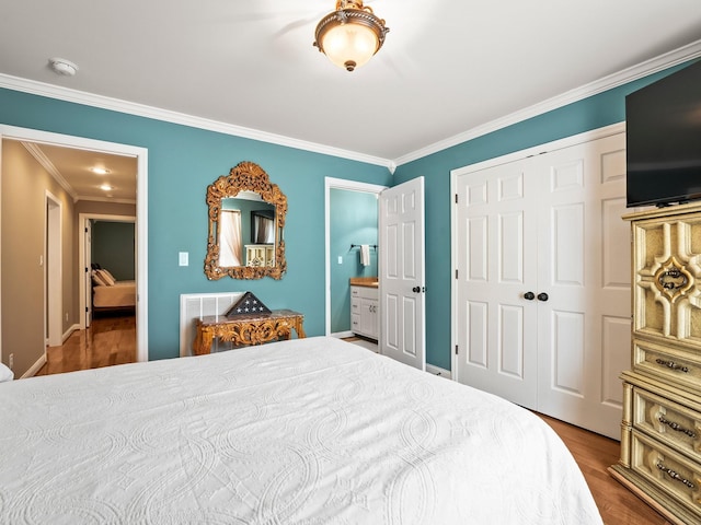 1574 Midway Rd, Sewanee, TN 37375 - bedroom featuring crown molding, a closet, and wood finished floors