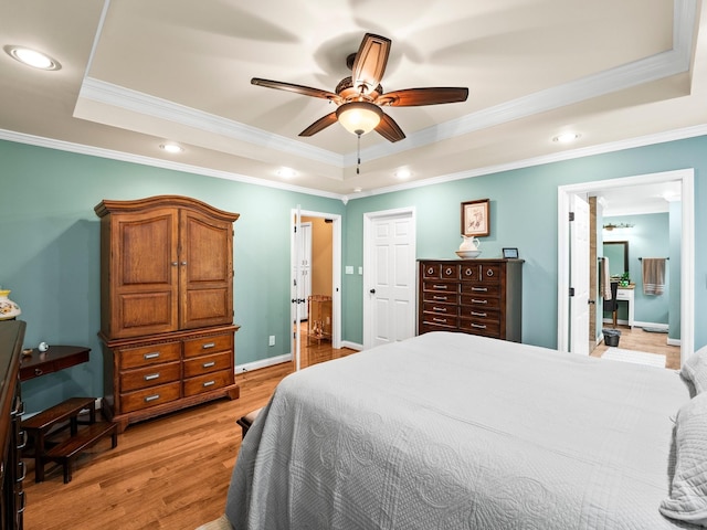 1574 Midway Rd, Sewanee, TN 37375 - bedroom with a tray ceiling, light wood finished floors, crown molding, recessed lighting, and baseboards
