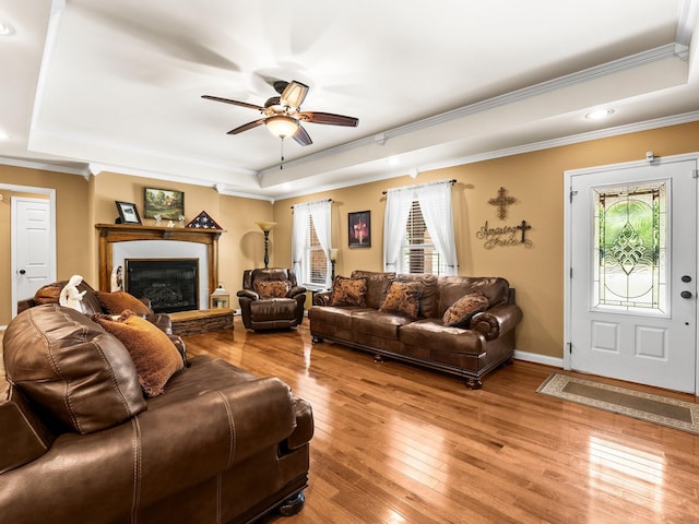 1574 Midway Rd, Sewanee, TN 37375 - living area featuring a raised ceiling, ornamental molding, ceiling fan, light wood-style flooring, and recessed lighting