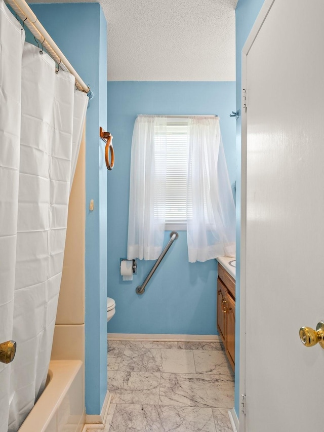1574 Midway Rd, Sewanee, TN 37375 - full bathroom featuring marble look tile flooring, vanity, toilet, shower / bath combination with curtain, and baseboards