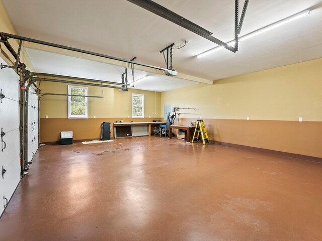 1574 Midway Rd, Sewanee, TN 37375 - garage featuring a garage door opener and baseboards