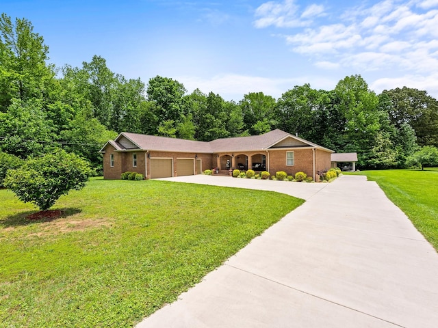 1574 Midway Rd, Sewanee, TN 37375 - single story home with concrete driveway, an attached garage, a front yard, and brick siding