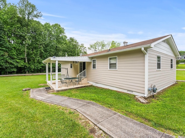 1574 Midway Rd, Sewanee, TN 37375 - back of house with a lawn and a patio area