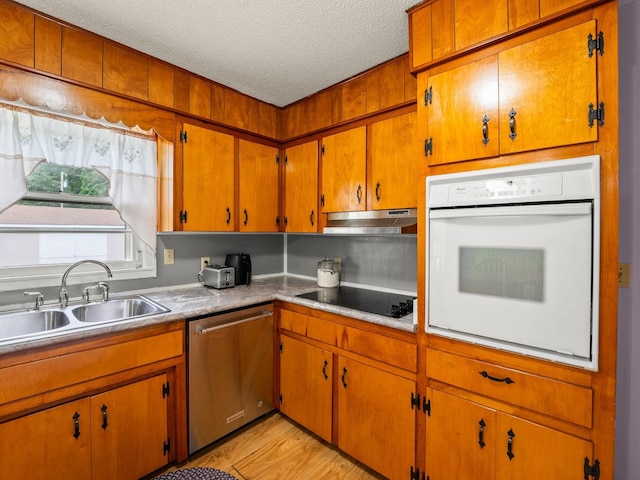 1574 Midway Rd, Sewanee, TN 37375 - kitchen featuring white oven, dishwasher, black electric stovetop, a sink, and under cabinet range hood