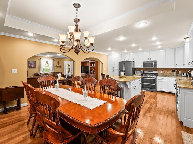 1574 Midway Rd, Sewanee, TN 37375 - dining space with arched walkways, a chandelier, light wood-style flooring, ornamental molding, and recessed lighting
