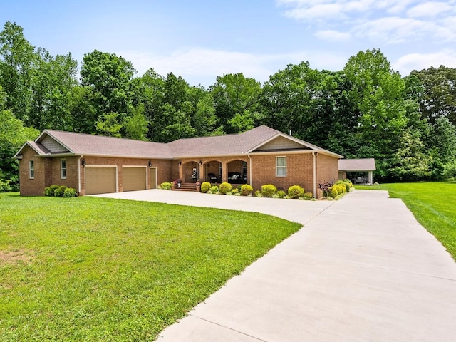 1574 Midway Rd, Sewanee, TN 37375 - ranch-style home featuring a garage, driveway, a front yard, and brick siding