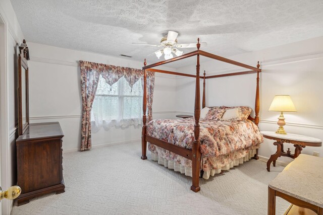 6873 Giles Hill Rd, College Grove, TN 37046 - bedroom featuring carpet flooring, a textured ceiling, ceiling fan, and baseboards