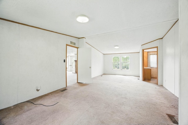 947 Buck Branch Rd, Charlotte, TN 37036 - empty room featuring ornamental molding, carpet flooring, and lofted ceiling