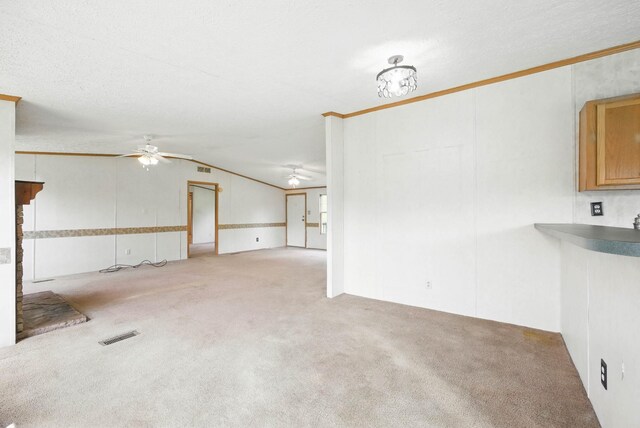 947 Buck Branch Rd, Charlotte, TN 37036 - unfurnished living room featuring ceiling fan, crown molding, carpet flooring, and lofted ceiling