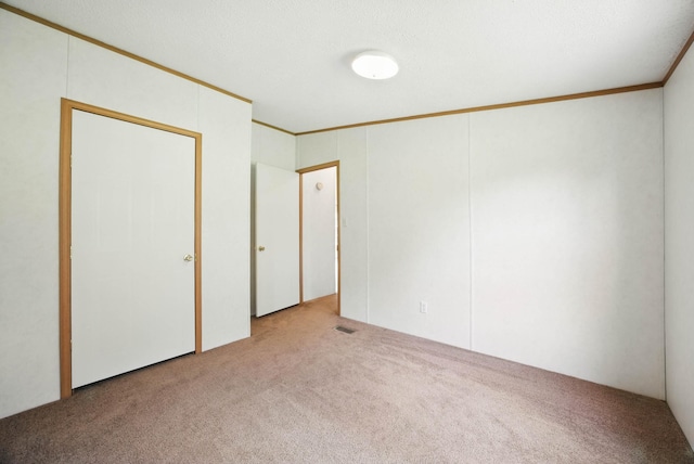 947 Buck Branch Rd, Charlotte, TN 37036 - unfurnished bedroom featuring carpet floors and crown molding