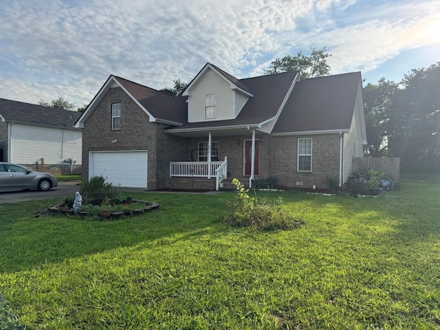 674 Superior Ln, Clarksville, TN 37043 - traditional-style home with covered porch, brick siding, a garage, and driveway