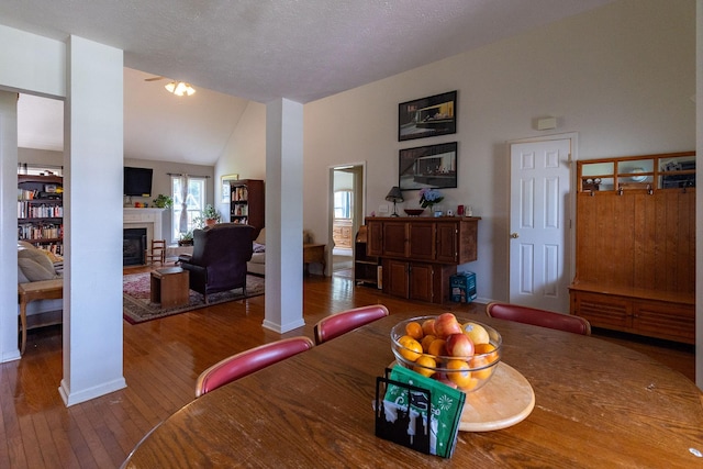 674 Superior Ln, Clarksville, TN 37043 - dining room with hardwood / wood-style floors, a fireplace, and high vaulted ceiling