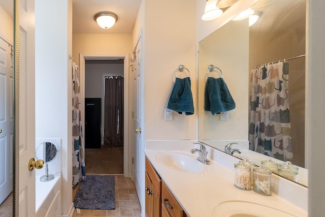 674 Superior Ln, Clarksville, TN 37043 - full bath with double vanity, tile patterned floors, curtained shower, and a bathtub