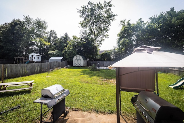 674 Superior Ln, Clarksville, TN 37043 - fenced backyard featuring a playground and a storage unit
