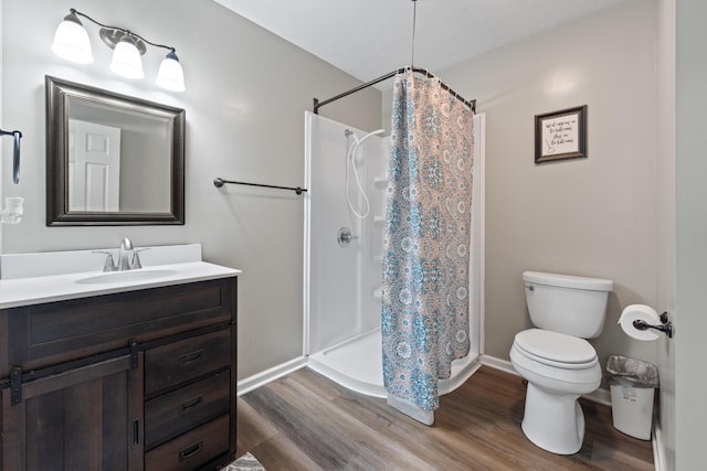 2237 Cold Springs Rd, Lafayette, TN 37083 - bathroom with wood finished floors, toilet, vanity, and a shower with curtain