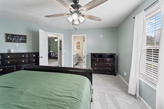 2237 Cold Springs Rd, Lafayette, TN 37083 - carpeted bedroom featuring baseboards, a spacious closet, a ceiling fan, and ensuite bathroom