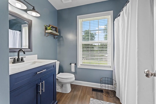2237 Cold Springs Rd, Lafayette, TN 37083 - full bathroom featuring toilet, vanity, wood finished floors, and baseboards