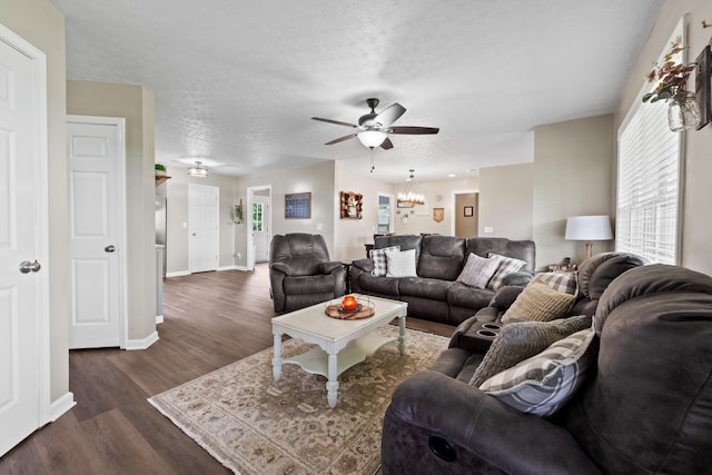 2237 Cold Springs Rd, Lafayette, TN 37083 - living area featuring ceiling fan, dark wood finished floors, baseboards, a chandelier, and a textured ceiling