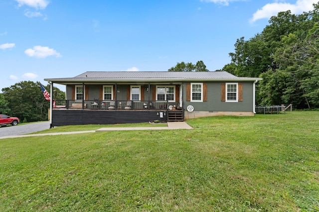2237 Cold Springs Rd, Lafayette, TN 37083 - view of front of home with covered porch, a front lawn, metal roof, and stucco siding