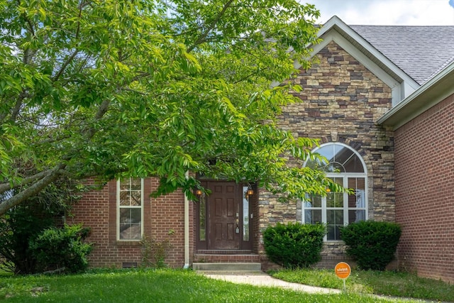 3696 Prestwicke Pl, Adams, TN 37010 - entrance to property with stone siding, brick siding, and roof with shingles