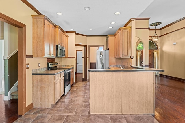 3696 Prestwicke Pl, Adams, TN 37010 - kitchen featuring stainless steel appliances, ornamental molding, a peninsula, light brown cabinetry, and recessed lighting