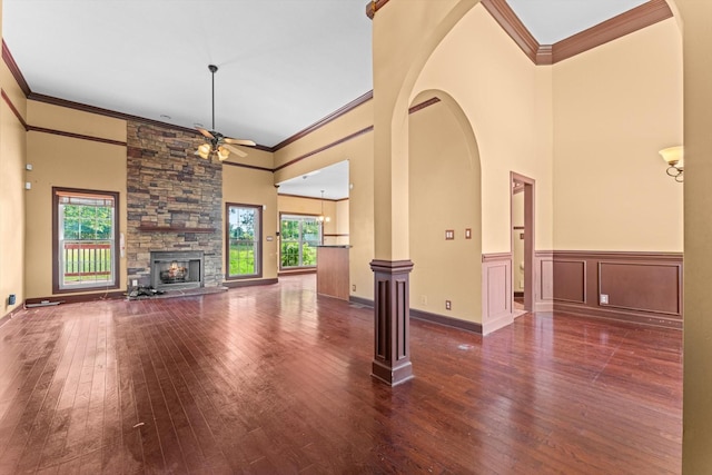 3696 Prestwicke Pl, Adams, TN 37010 - unfurnished living room with ornamental molding, healthy amount of natural light, ceiling fan, hardwood / wood-style floors, and wainscoting