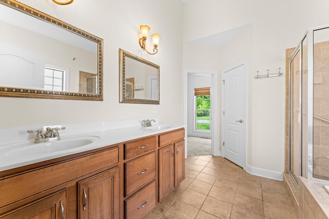 3696 Prestwicke Pl, Adams, TN 37010 - full bathroom featuring a tile shower, double vanity, and tile patterned flooring