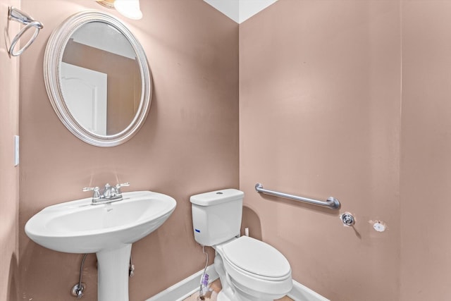 3696 Prestwicke Pl, Adams, TN 37010 - half bathroom with baseboards and toilet
