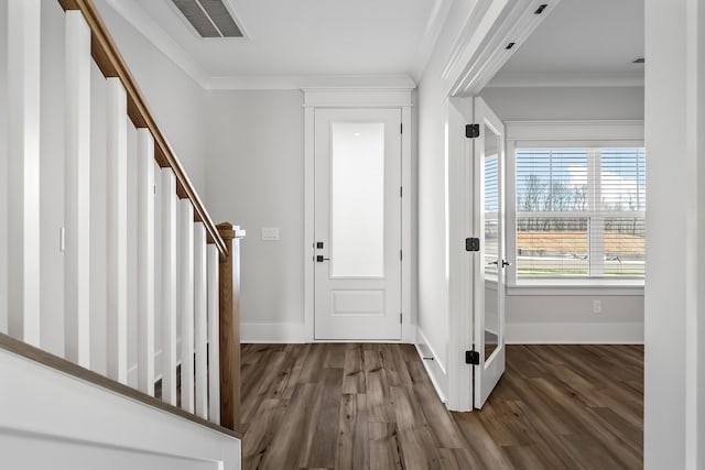 556 Kingwood Ln, White House, TN 37188 - entrance foyer featuring wood finished floors, baseboards, stairway, and crown molding