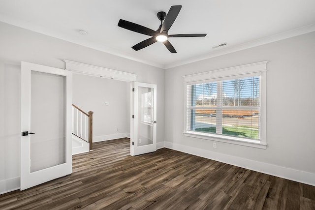 556 Kingwood Ln, White House, TN 37188 - unfurnished room with dark wood-type flooring, crown molding, ceiling fan, baseboards, and stairway