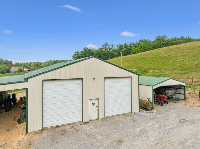 8663 Dog Creek Rd, Primm Springs, TN 38476 - garage with a detached garage