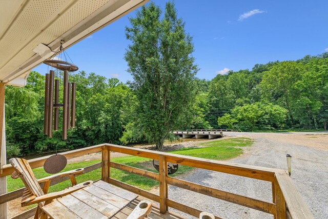 8663 Dog Creek Rd, Primm Springs, TN 38476 - wooden deck with a wooded view