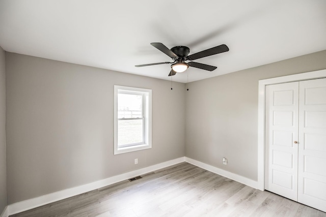 1108 Pruitt Ln, Gallatin, TN 37066 - unfurnished bedroom featuring light wood-style flooring, a closet, and ceiling fan