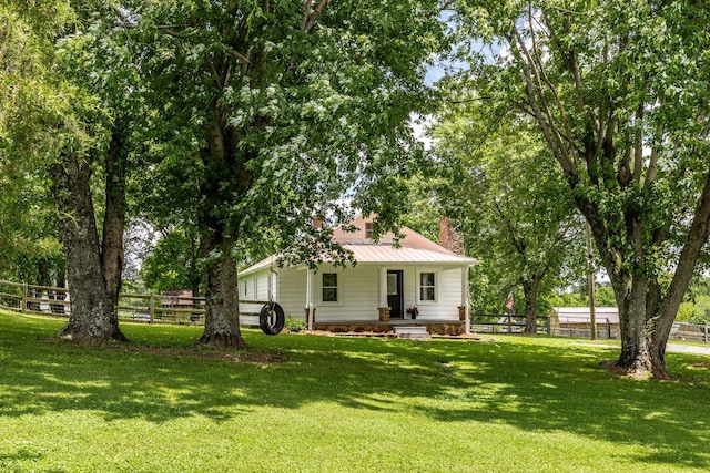 1108 Pruitt Ln, Gallatin, TN 37066 - view of front of home with a chimney and covered porch