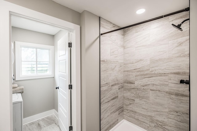 1108 Pruitt Ln, Gallatin, TN 37066 - bathroom with washer / clothes dryer, tiled shower, vanity, marble look tile flooring, and recessed lighting
