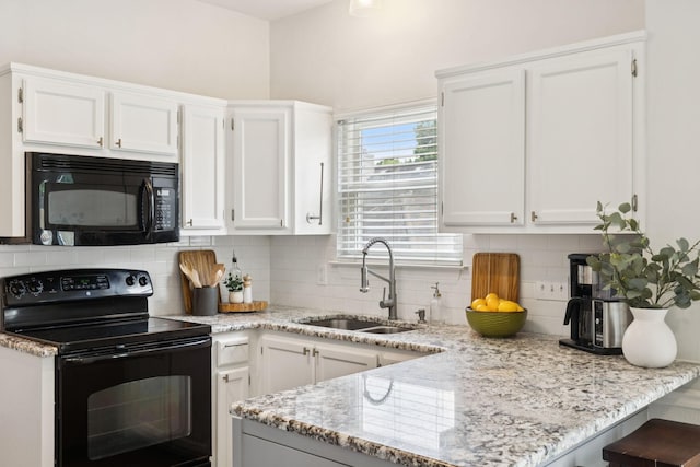 3453 Parkwood Ct, Hermitage, TN 37076 - kitchen featuring black appliances, a sink, and white cabinets