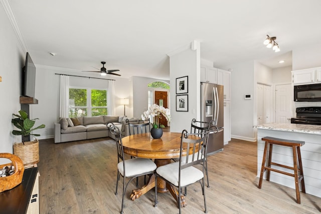 3453 Parkwood Ct, Hermitage, TN 37076 - dining space with a ceiling fan, light wood-style flooring, baseboards, and crown molding