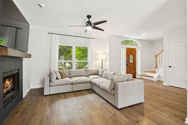 3453 Parkwood Ct, Hermitage, TN 37076 - living room with healthy amount of natural light, a tile fireplace, wood-type flooring, recessed lighting, and crown molding
